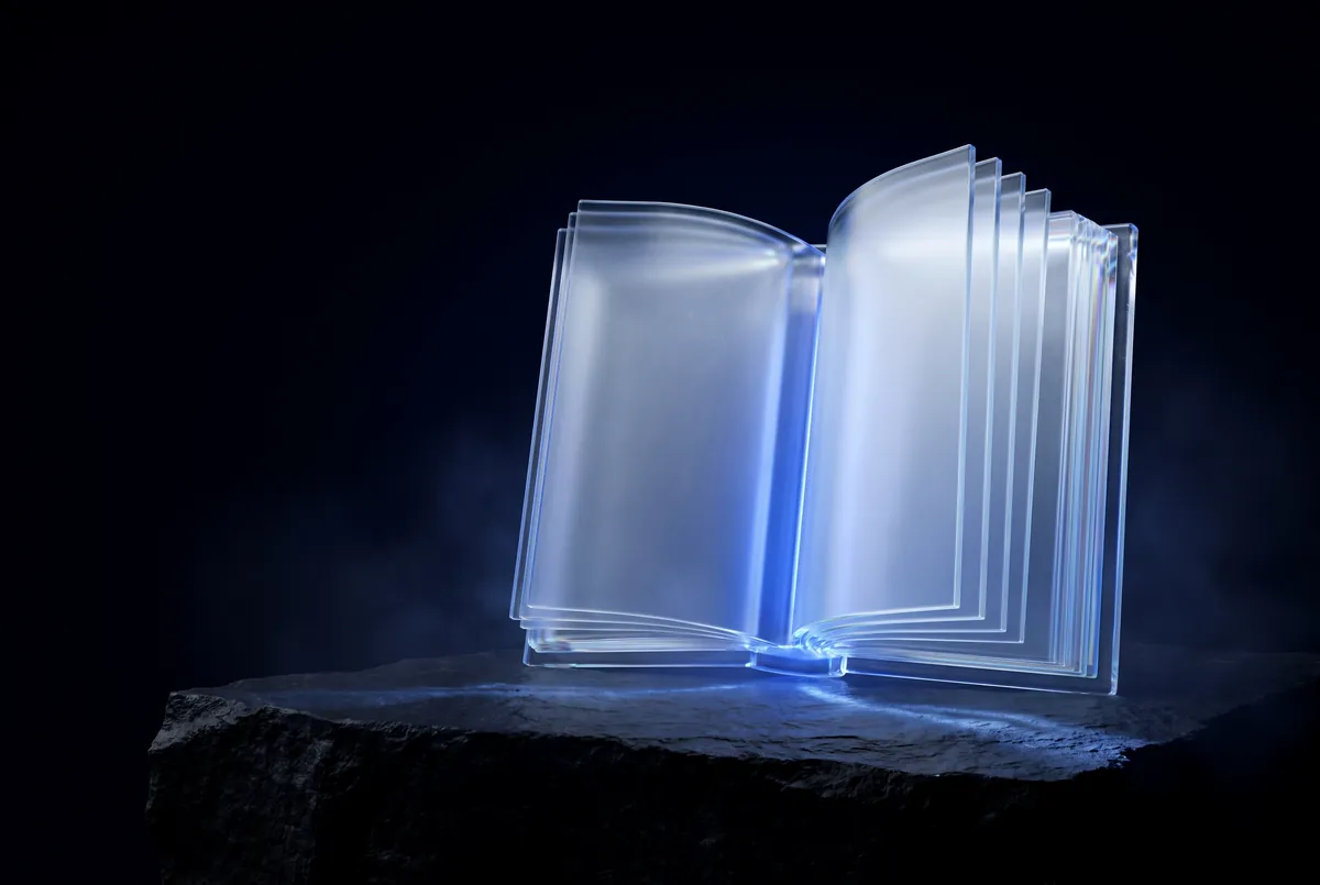An open book with glass pages glowing blue